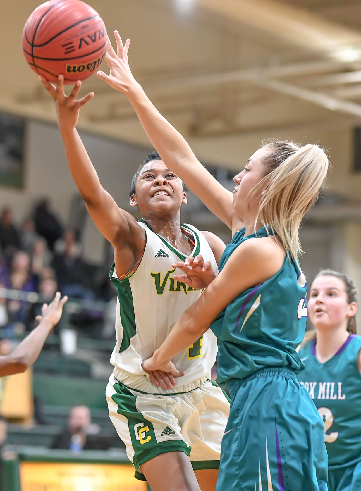 Friday night high school basketball action